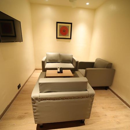 Hotel Marigold Bhuvanesvar Szoba fotó