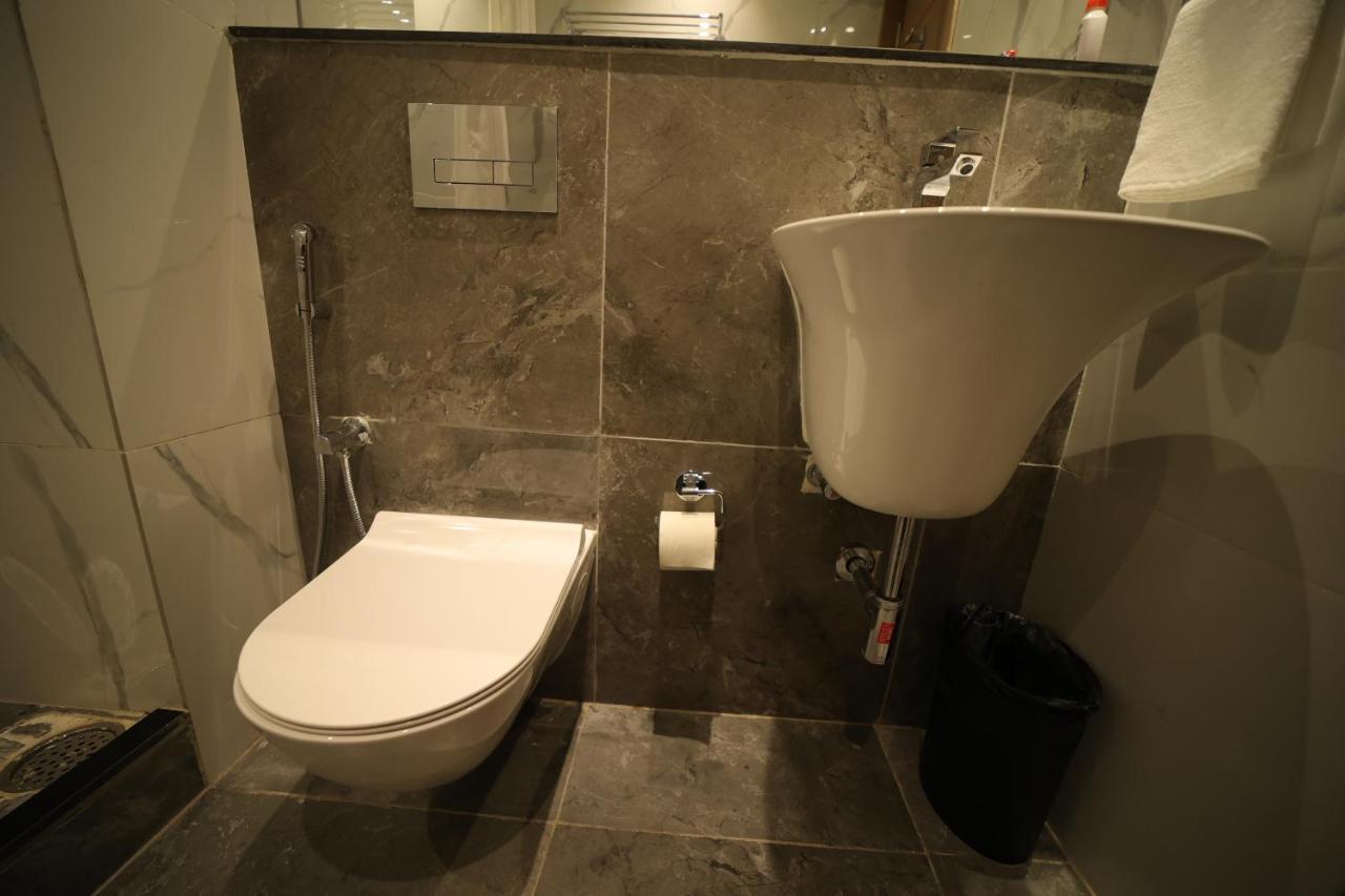 Hotel Marigold Bhuvanesvar Szoba fotó