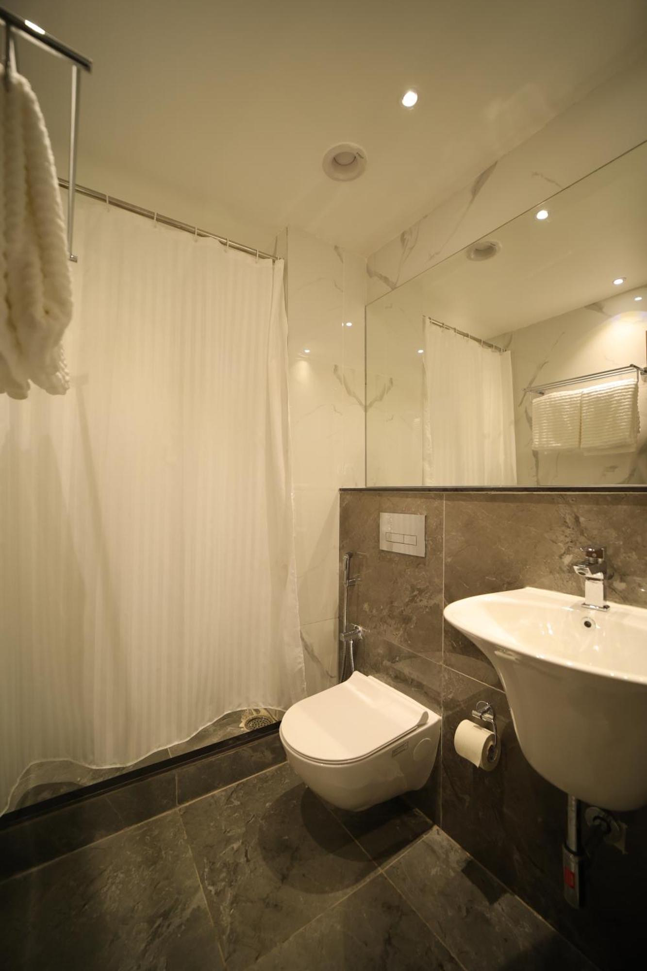 Hotel Marigold Bhuvanesvar Szoba fotó