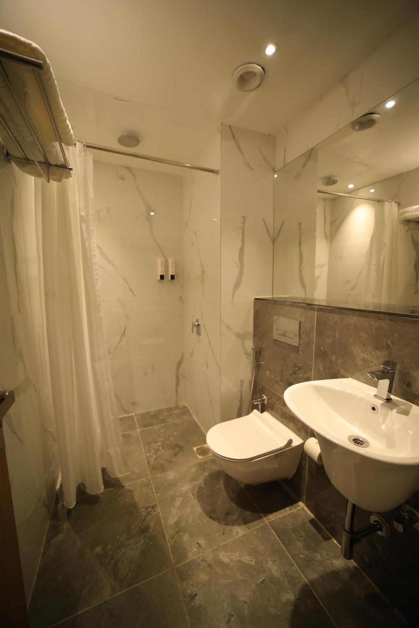 Hotel Marigold Bhuvanesvar Szoba fotó